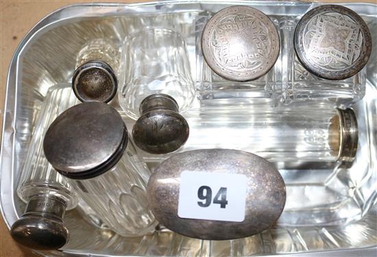 8 silver topped scent bottles